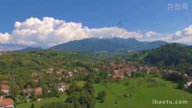 从空中俯瞰山上的小村庄，夏日美丽的风景